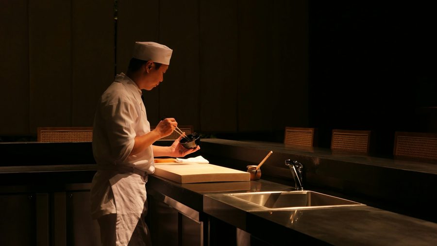 Ren at the counter late at night