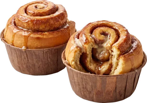 Two cinnamon buns in paper cups